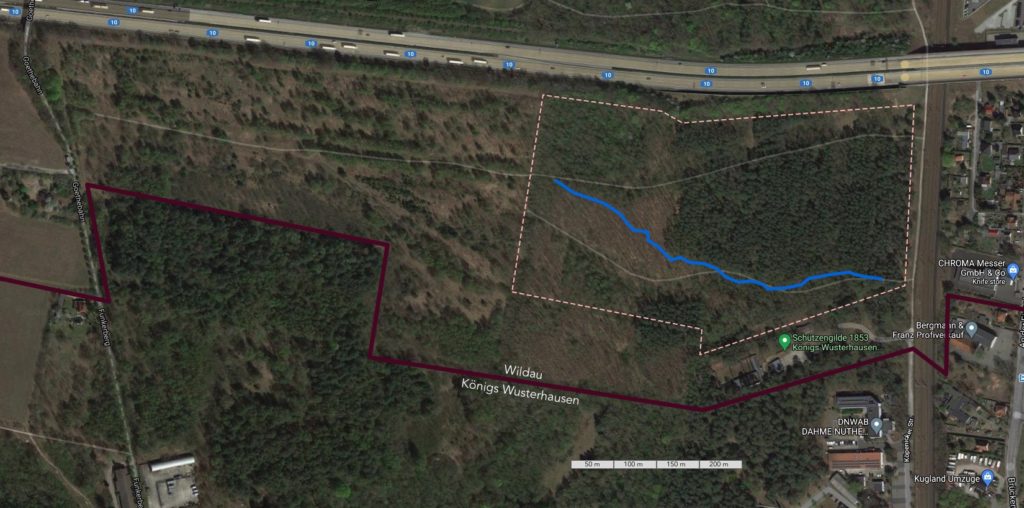 Trails area border and blue trail route on Google Maps.
